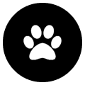 A black and white paw print in the center of a circle.