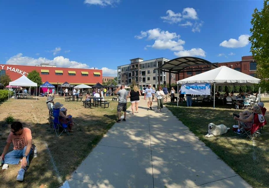 A view of people at an outdoor market.